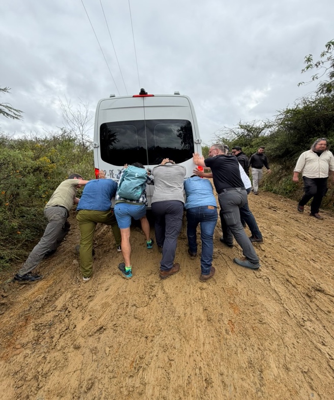 An adventurous start: Banding together to push our vans up the slick, mud-caked entrance to San Pablo Etla