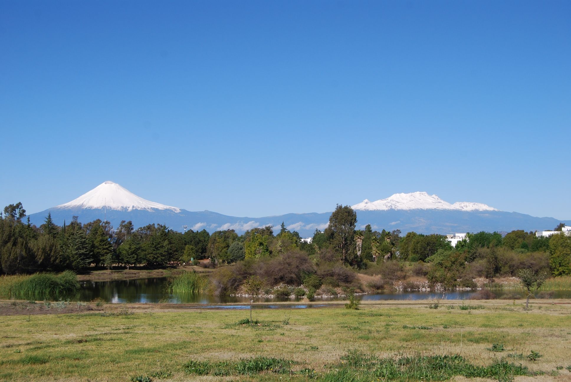 JB BUAP with volcanoes in the distance